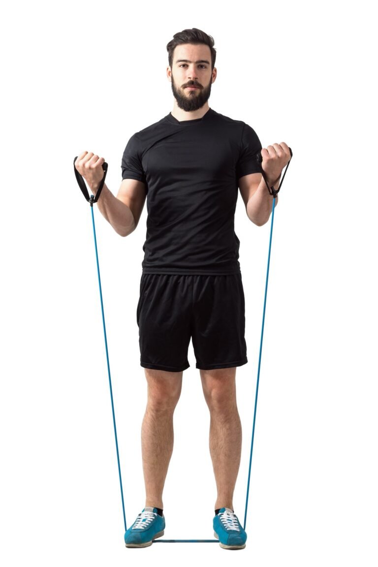 Le curl de biceps avec élastique : technique, conseils et erreurs à éviter